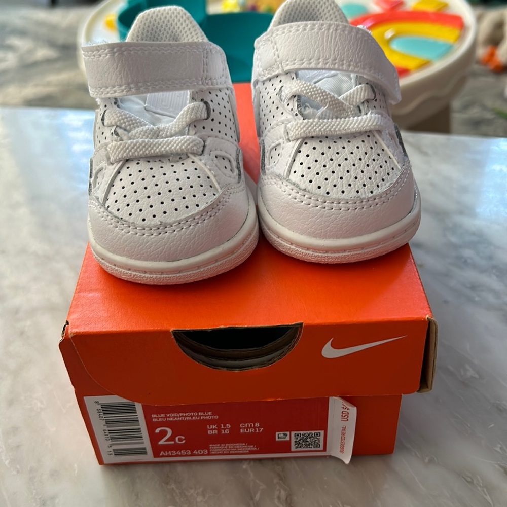 Like new Nike baby white sneaker